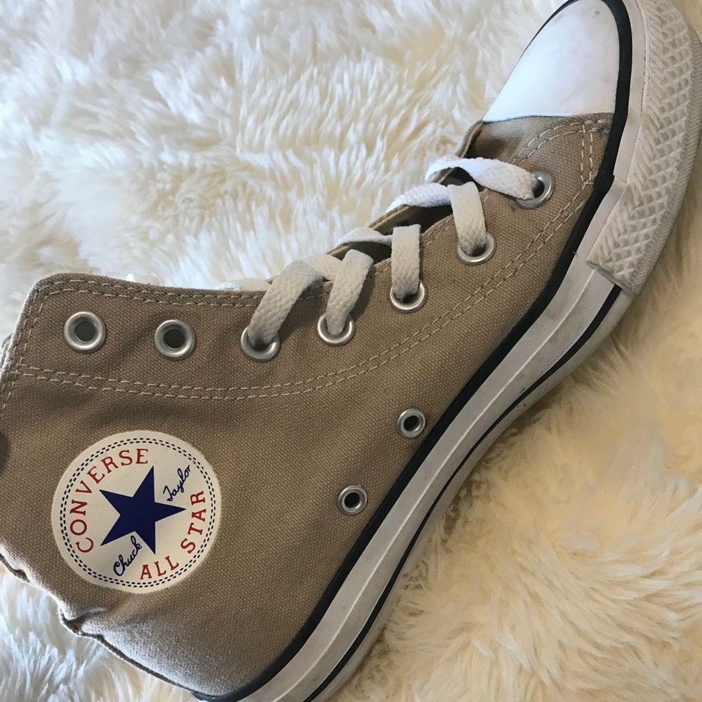 Tan women’s high top converse